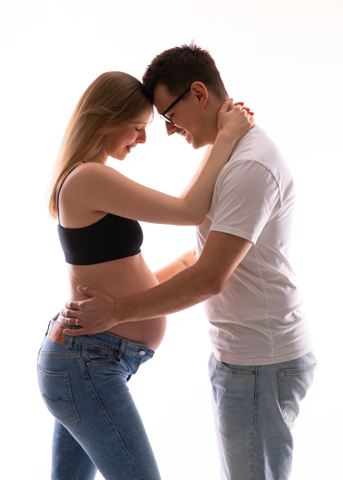 Babybauch mit Partner